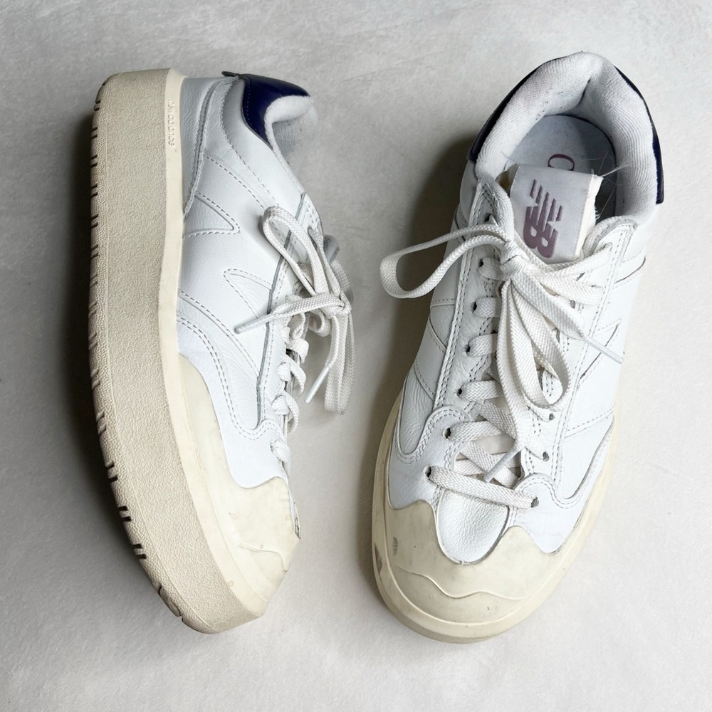 New Balance White and Blue Sneakers